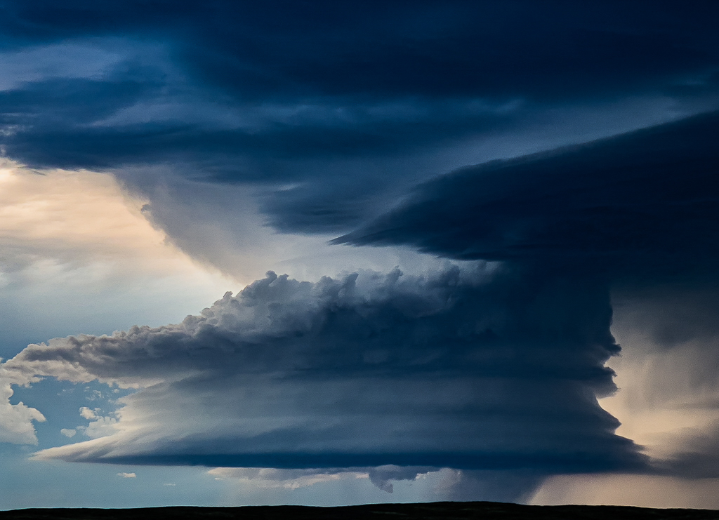 Towering supercell updraft building over the Great Plains