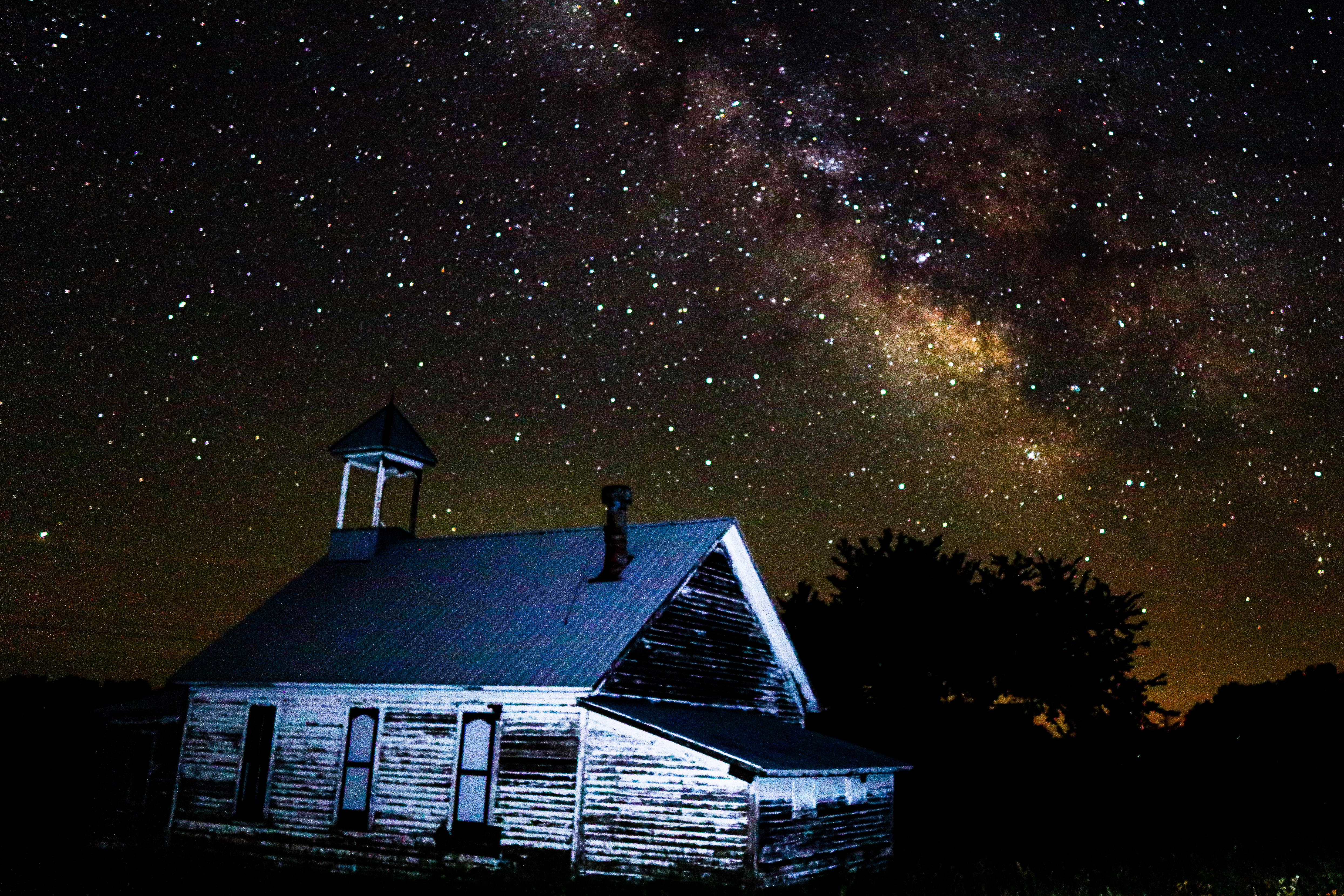 Milky Way rising over a historic one-room schoolhouse on the Kansas prairie